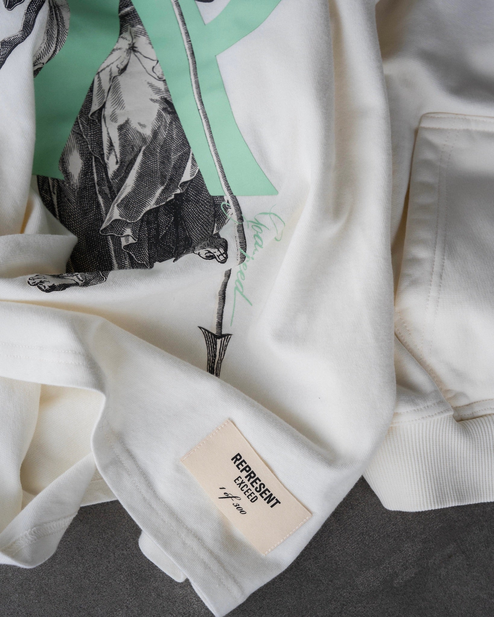 Represent x Exceed Archangel Initial T-Shirt Salt 1/300 (Worldwide Exclusive)