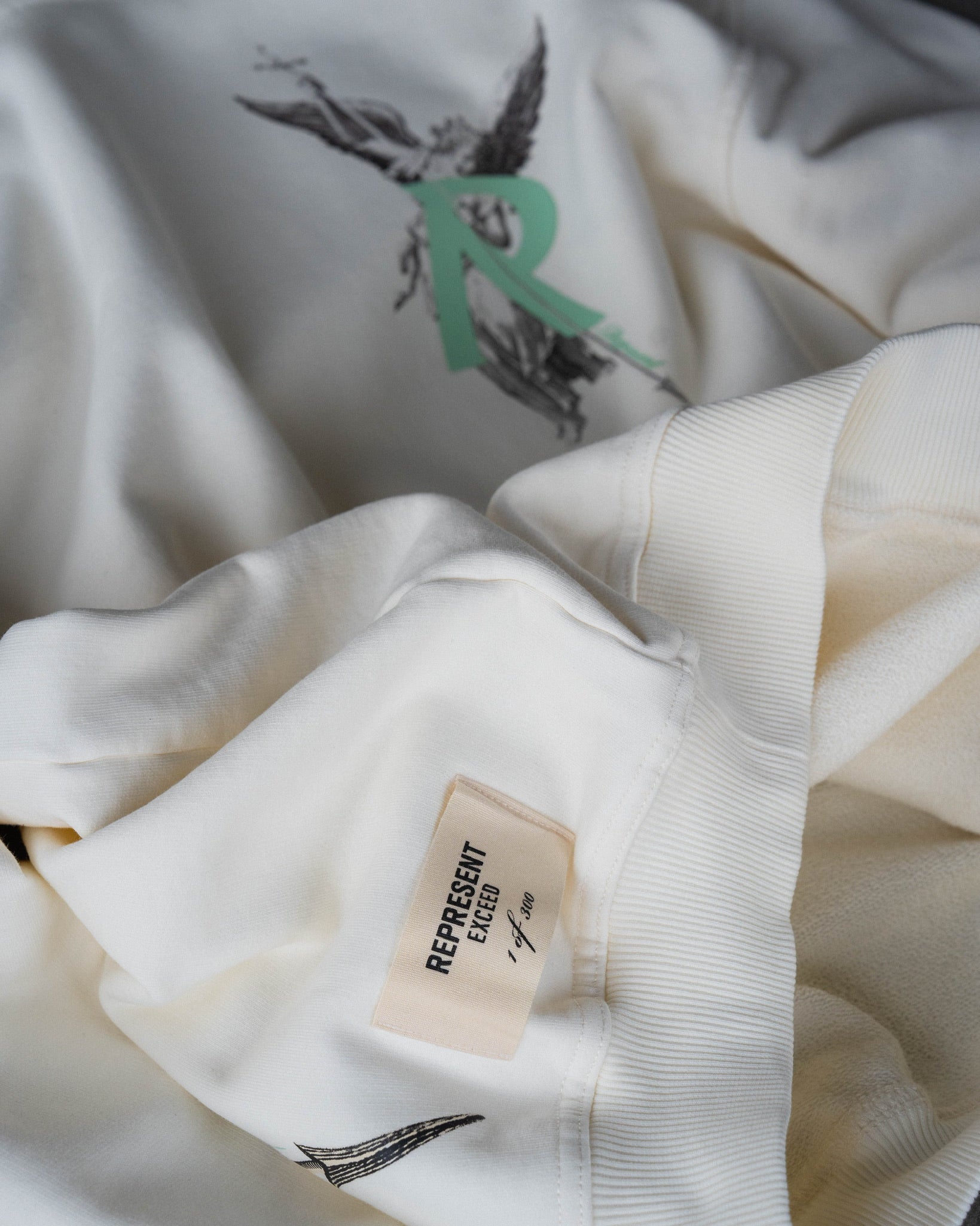 Represent x Exceed Archangel Initial Hoodie Salt 1/300 (Worldwide Exclusive)