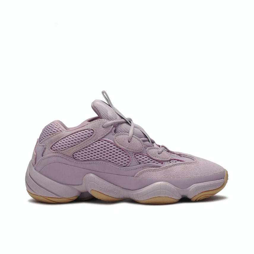 yeezy 500 light pink/purple sneaker with gum coloured runner sole. The shoe contains laces with a mesh upper